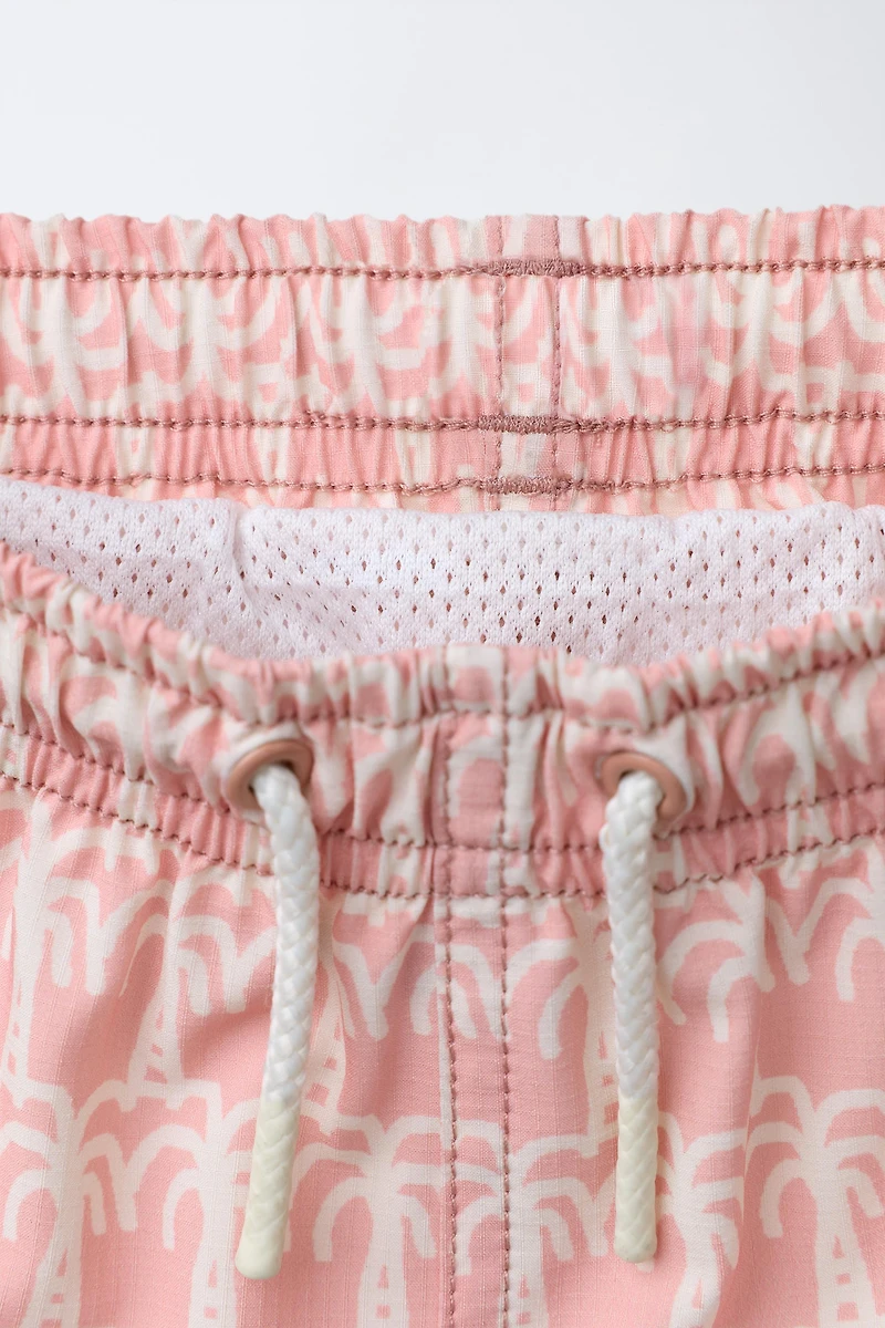 AGES 6-14 / PALM TREE SWIM SHORTS