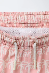 AGES 6-14 / PALM TREE SWIM SHORTS