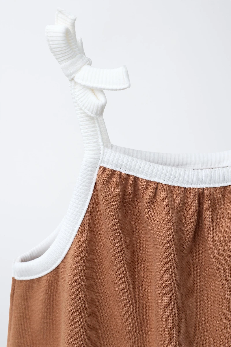 CONTRAST PIPING ROMPER