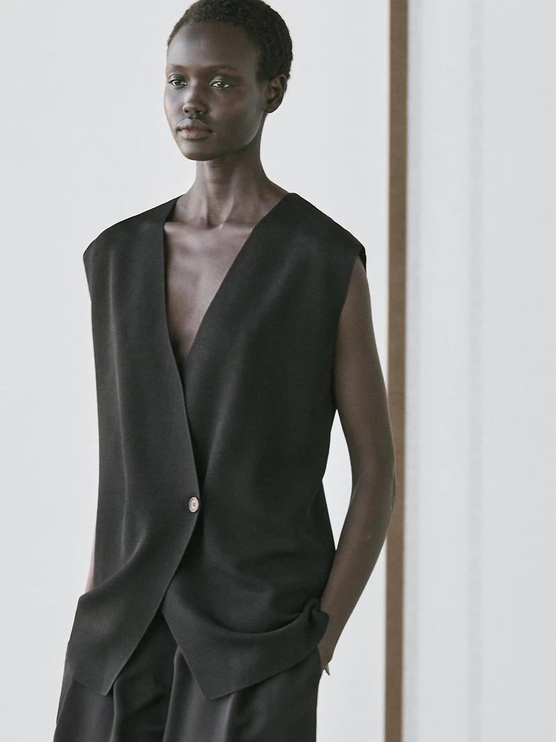 Long double-breasted vest