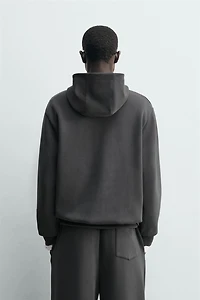 SWEAT DÉLAVÉ SOFT À CAPUCHE