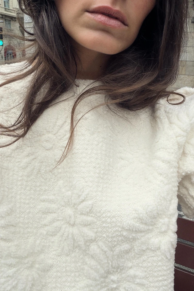 TOP EN MAILLE À MANCHES BOUFFANTES