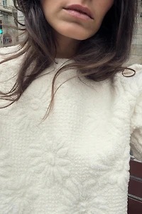 TOP EN MAILLE À MANCHES BOUFFANTES