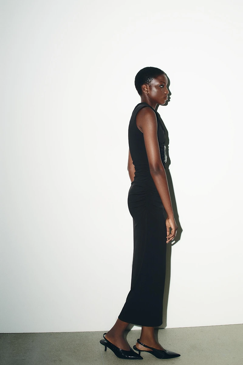 SPARKLY DRAPED CUT OUT DRESS