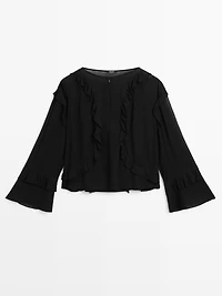 Flowing blouse with ruffles and zip