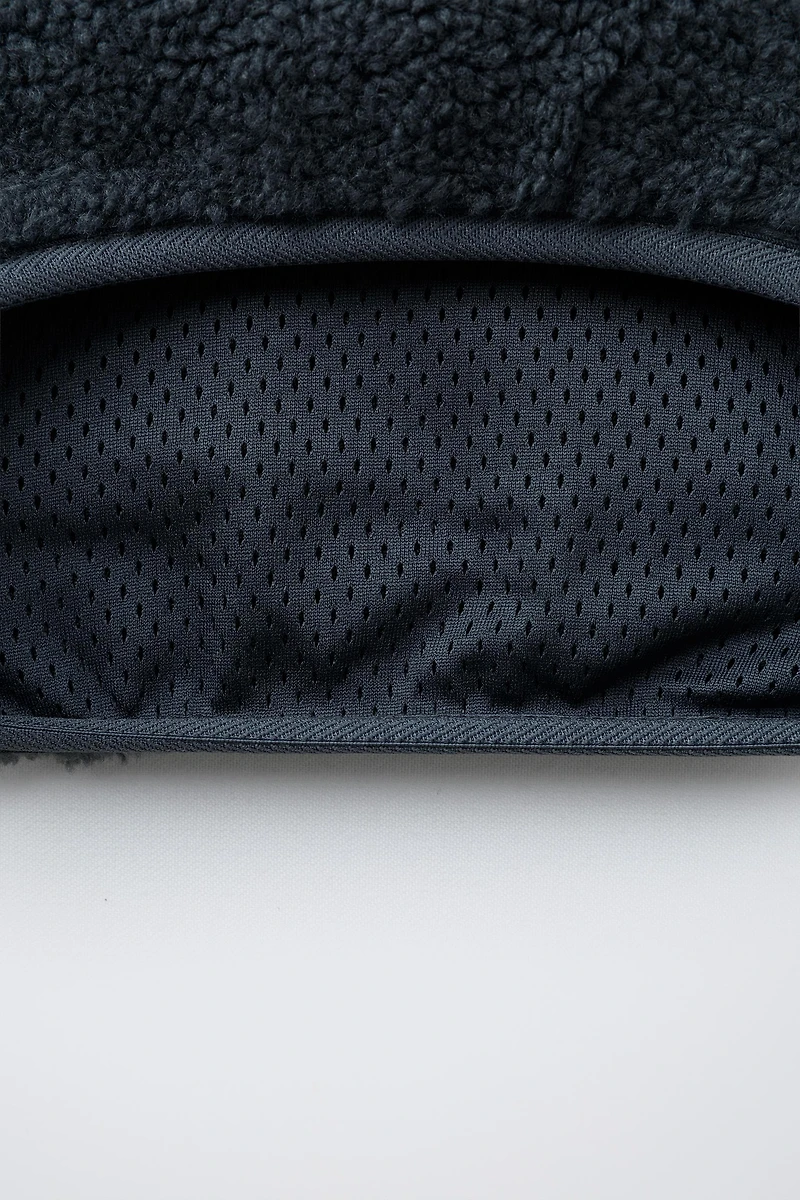 FAUX SHEARLING SWEATER WITH RUBBERIZED LOGO