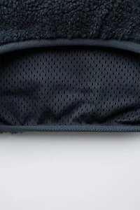 FAUX SHEARLING SWEATER WITH RUBBERIZED LOGO