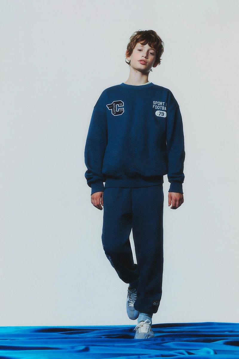 TEXT JOGGING SWEATSHIRT