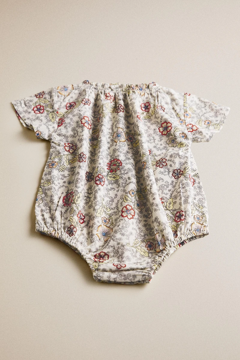 BABY FLORAL FOOTED ROMPER