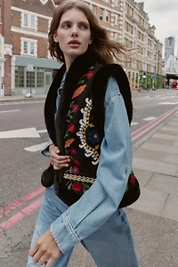 CONTRASTING EMBROIDERED FAUX FUR VEST