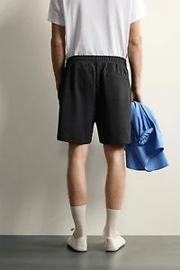RELAXED FIT INTERLOCK TRACK SHORTS