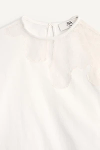 LIMITED EDITION ASYMMETRIC LACE T-SHIRT