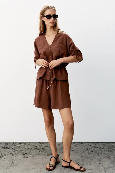 VESTE SAFARI MANCHES COURTES ET FANTAISIE