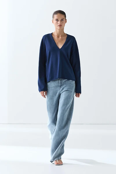 Pull rayé en maille col V