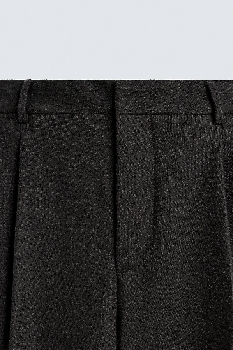 LIMITED EDITION PLEATED WOOL PANTS