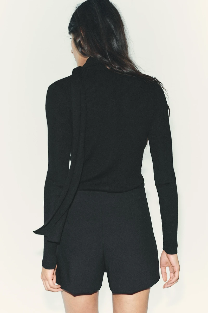 ASYMMETRICAL CULOTTE SKIRT WITH APPLIQUE
