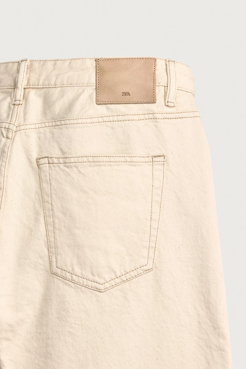 SLIM TAPERED FIT JEANS