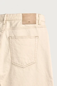 SLIM TAPERED FIT JEANS