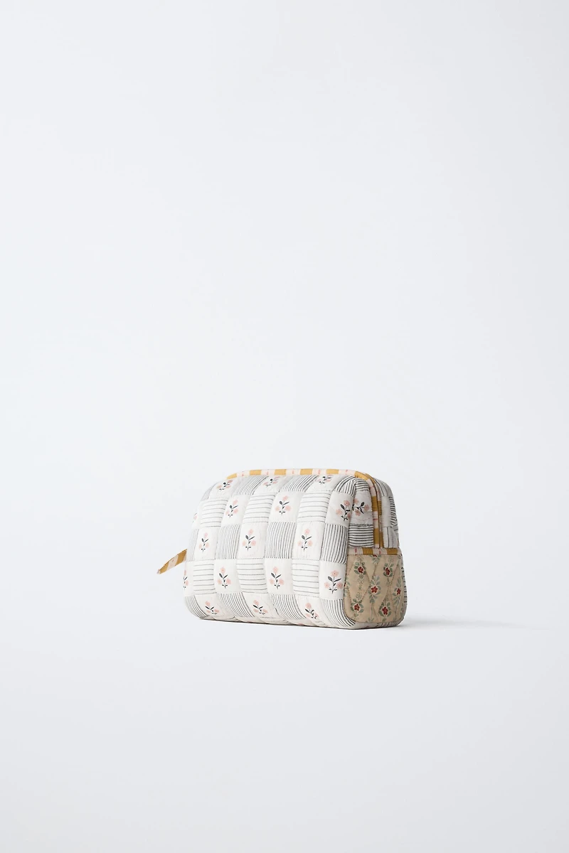 QUILTED MATERNITY TOILETRY BAG