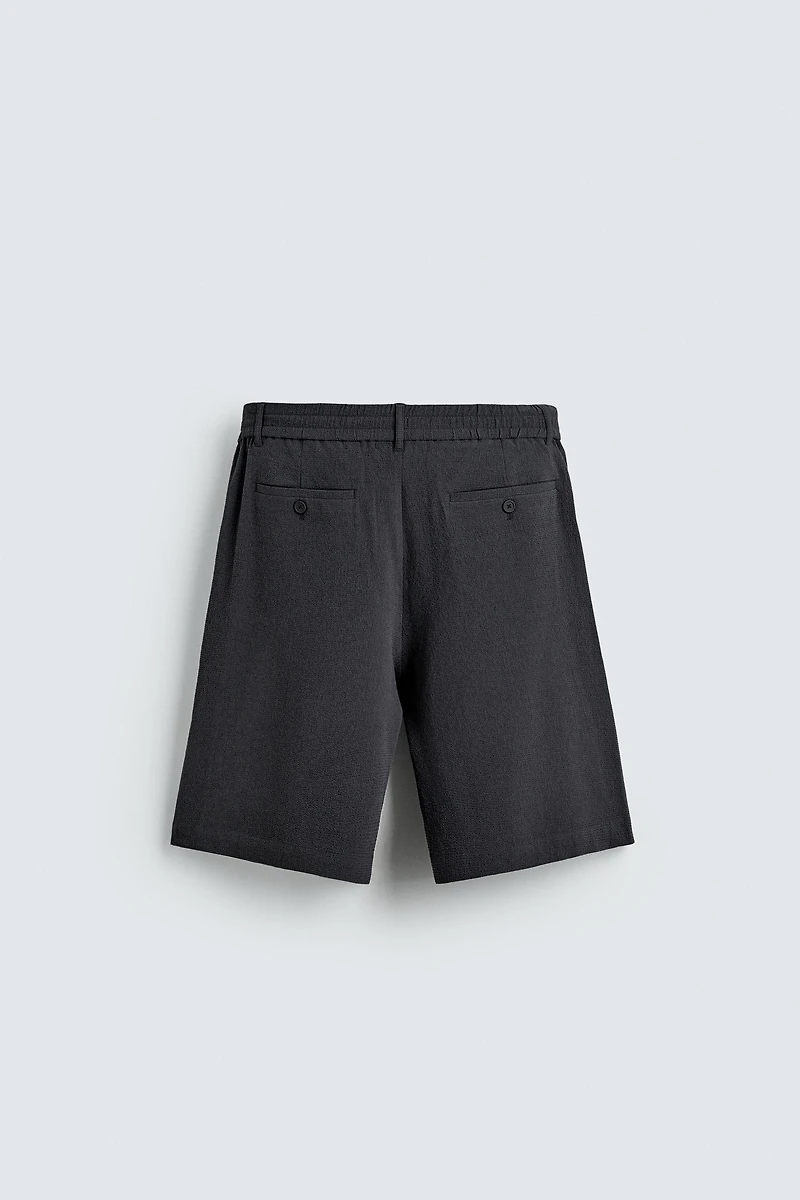IRREGULAR TEXTURE PLEATED SHORTS