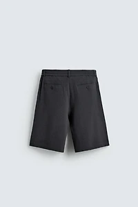 IRREGULAR TEXTURE PLEATED SHORTS