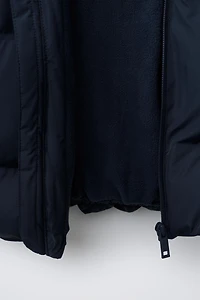 BLOUSON MATELASSÉ À CAPUCHE DÉPERLANT