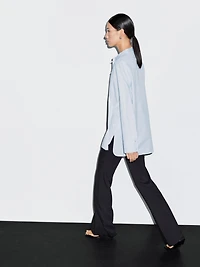 Shirt with stand collar and bib
