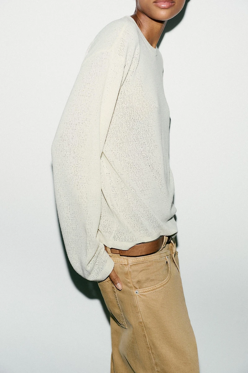 CUT-OUT KNIT SWEATER