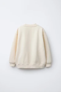 TEXT AND BOW PRINT SWEATSHIRT
