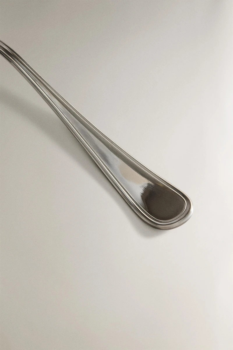 SHINY STEEL SERVING FORK