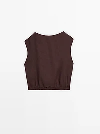 Linen blouse with elasticated hem