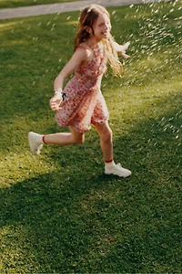 SHORT RUFFLED FLORAL JUMPSUIT