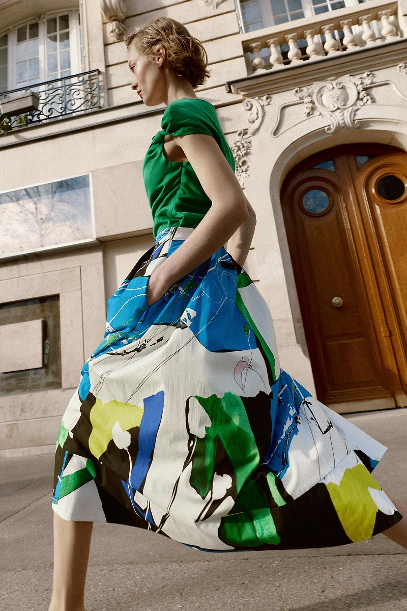 PLEATED PRINTED MIDI SKIRT
