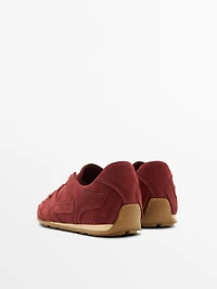 Split leather trainers with piece details