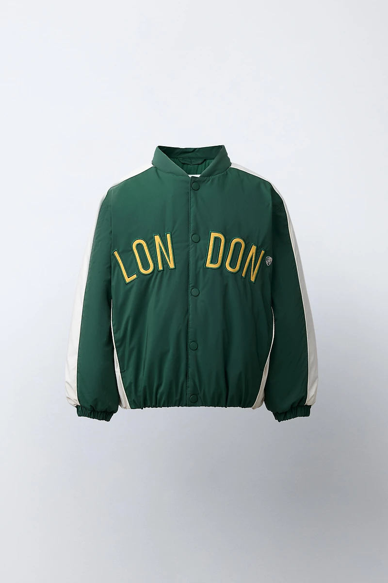 BLOUSON BOMBER CAPUCHE EN MOLLETON AMOVIBLE DÉPERLANT