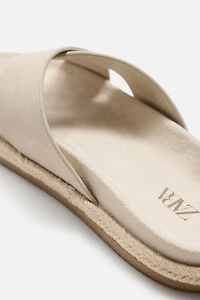 CROSSED LEATHER SANDALS