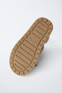 BOTTES À FANTAISIE EFFET FOURRURE