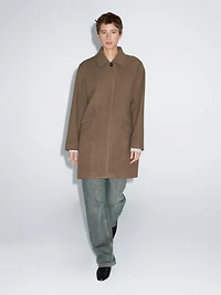 Mid-length wool blend coat with flap pockets