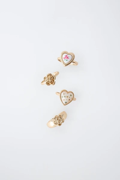 FOUR-PACK OF FLOWER AND HEART RINGS