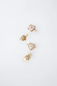 FOUR-PACK OF FLOWER AND HEART RINGS