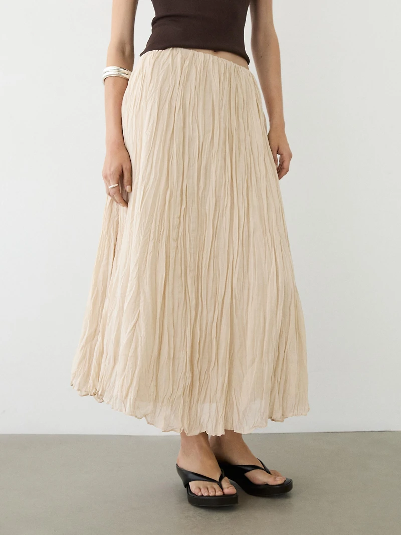 Flowing midi skirt with pleated detail