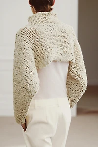 PULL COURT EN MAILLE À BANDE ENTRELAÇÉE