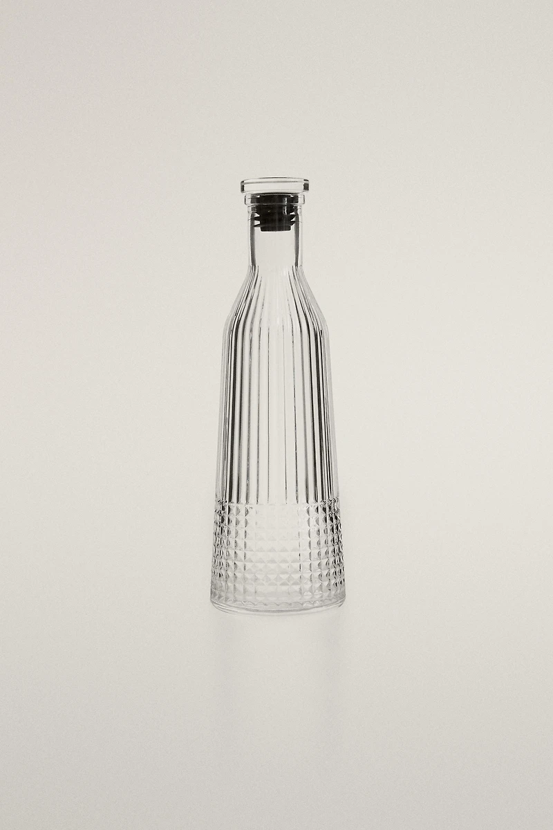 RAISED DESIGN GLASS BOTTLE