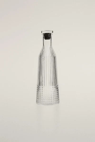 RAISED DESIGN GLASS BOTTLE