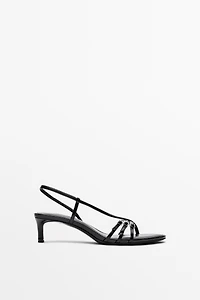 Leather heeled sandals with buckles