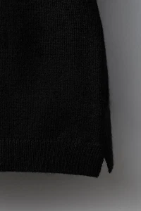 PULL EN MAILLE À COL CHEMINÉE