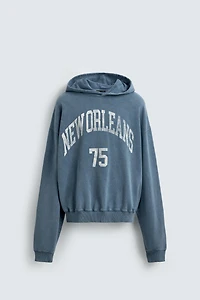 WASHED PRINTED TEXT SWEATSHIRT