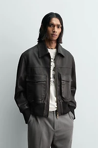 BLOUSON COURT EN CUIR NAPPÉ
