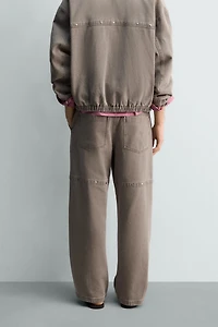 RELAXED FIT STUDDED PANTS