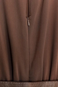 SLEEVELESS BELTED JUMPSUIT